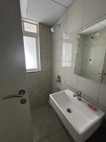 Bathroom in 3 BHK Apartment at Godrej Green Cove, Mahalunge – for Rent
