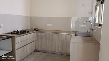 Kitchen in 3 BHK Apartment at Hiranandani Estate Rodas Enclave, Ghodbunder Road – for Rent