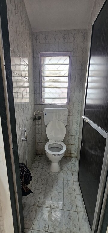Bathroom in 1 BHK Apartment at Asmita Jyoti CHS, Malad West – for Rent