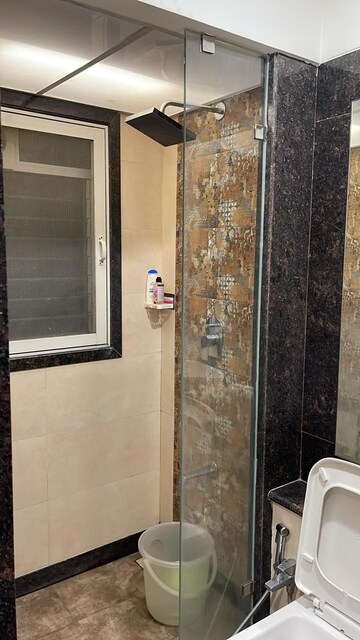 Bathroom in 1 BHK Apartment at Swapnlok CHS, Malad East – for Rent