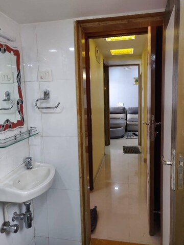 Bathroom in 2 BHK Apartment at Puranik Hometown, Ghodbunder Road – for Rent