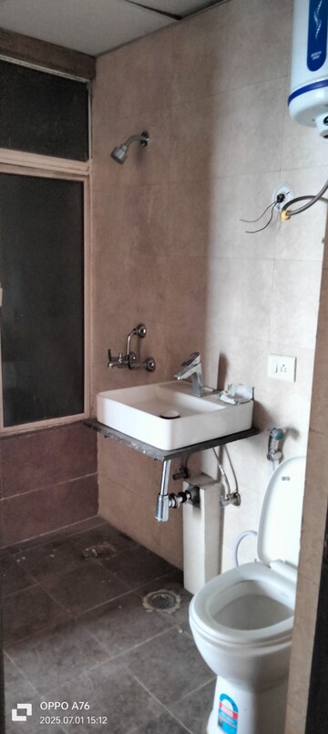 Bathroom in 3 BHK Apartment at M R Platinum 321, Raj Nagar Extension – for Sale