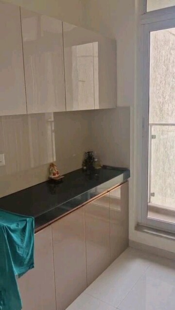 Kitchen in 2 BHK Apartment at Rustomjee Urbania Azziano L Wing, Thane West – for Sale