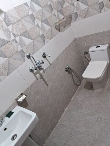 Bathroom in 1 BHK Apartment at NK Sharma Savitry Greens, Lohgarh – for Rent