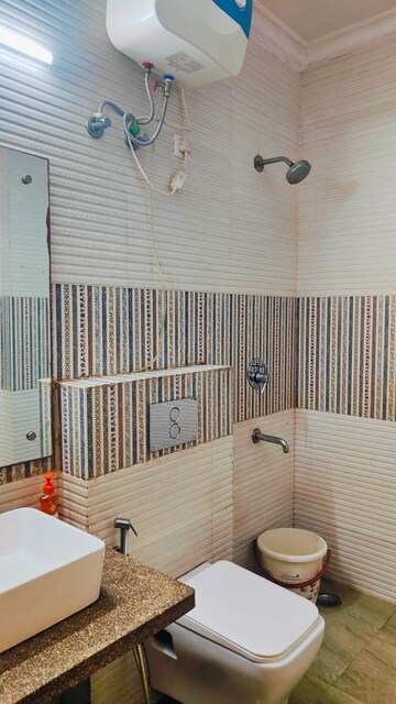 Bathroom in 2 BHK Apartment at Pareena Laxmi Apartments, Sector 99 – for Rent