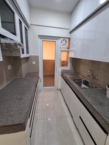 Kitchen in 2 BHK Apartment at Eldeco Acclaim, Sohna Sector 2 – for Rent