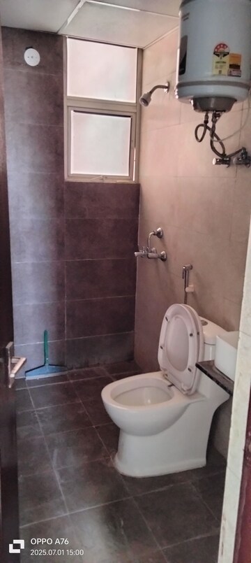 Bathroom in 3 BHK Apartment at M R Platinum 321, Raj Nagar Extension – for Sale