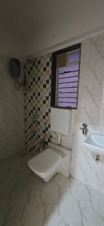 Bathroom in 1 BHK Apartment at Dharti Pressidio, Kandivali West – for Sale