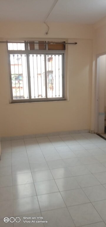 Room in 1 RK Apartment at New Mhada Tower, Malad West – for Rent
