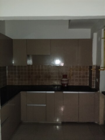 Kitchen in 3 BHK Apartment at JKG Palm Court, Sector 16c Greater Noida – for Rent