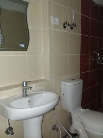 Bathroom in 3 BHK Apartment at JKG Palm Court, Sector 16c Greater Noida – for Rent