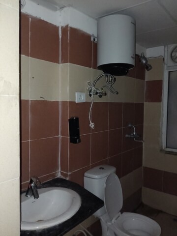 Bathroom in 3 BHK Apartment at JKG Palm Court, Sector 16c Greater Noida – for Rent