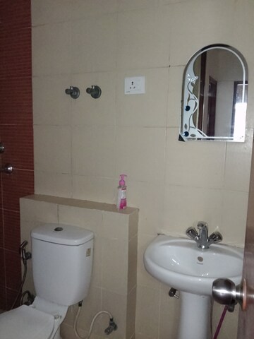 Bathroom in 3 BHK Apartment at JKG Palm Court, Sector 16c Greater Noida – for Rent