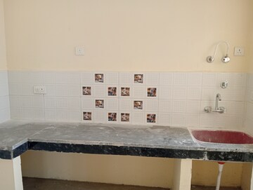 Kitchen in 2 BHK Apartment at Eureka Diya Green City, Raj Nagar Extension – for Rent