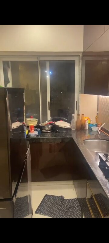 Kitchen in 2 BHK Apartment at Raheja Interface Heights, Malad West – for Rent