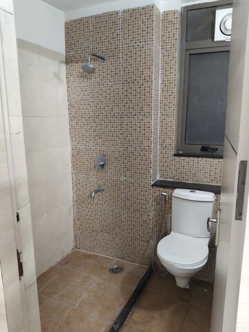 Bathroom in 2 BHK Apartment at Unitech Uniworld Resorts-The Residences, Sector 33 – for Rent