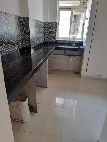Kitchen in 1 BHK Apartment at Lodha Amara, Kolshet Road – for Sale