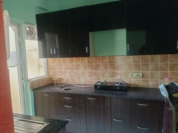 Kitchen in 3 BHK Apartment at Aims Golf Avenue II, Sector 75 – for Rent