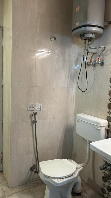Bathroom in 2 BHK Builder Floor at East Of Kailash – for Rent