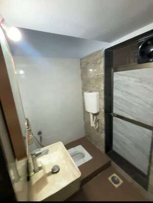 Bathroom in 3 BHK Apartment at Virani Sukoon Heights, Kausa – for Sale