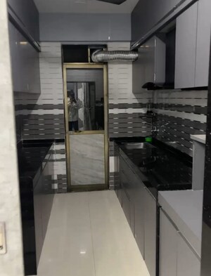 Kitchen in 3 BHK Apartment at Virani Sukoon Heights, Kausa – for Sale