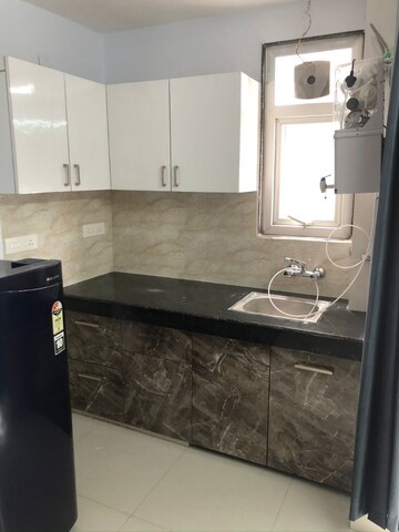 Kitchen in 4 BHK Apartment at BPTP Park Prime, Sector 66 – for Rent