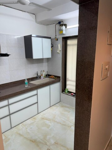 Kitchen in 2 BHK Apartment at JV Sweena, Andheri East – for Sale