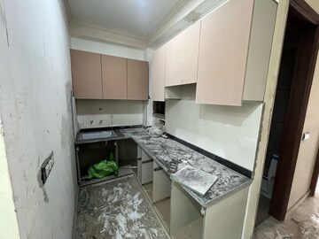 Kitchen in 1 BHK Apartment at Chattarpur – for Sale