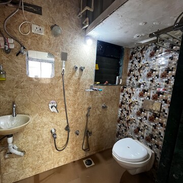 Bathroom in 2 BHK Apartment at Yashraj Park CHS, Kasarvadavali – for Rent