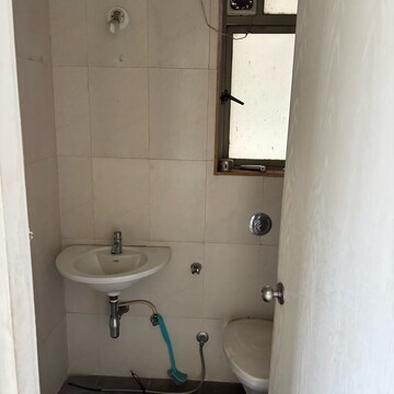 Bathroom in 1.5 BHK Apartment at Lodha Casa Bella Gold, Desai Village – for Rent