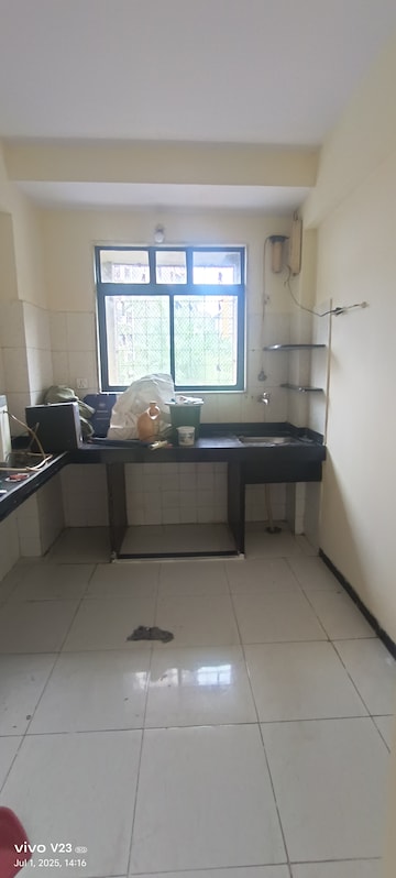 Kitchen in 1 BHK Apartment at AMI Jharna, Goregaon East – for Rent