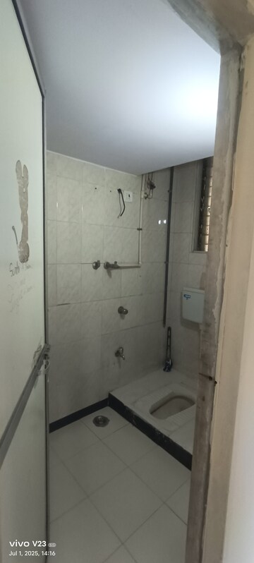 Bathroom in 1 BHK Apartment at AMI Jharna, Goregaon East – for Rent