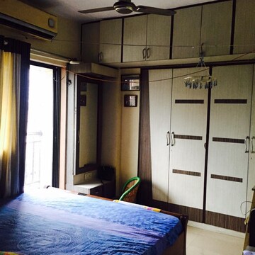 Bedroom in 1 BHK Apartment at Marigold CHS Panch Pakhadi, Talav Pali – for Rent