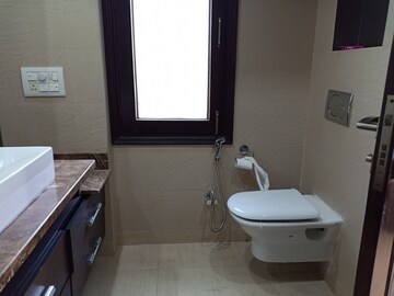 Bathroom in 3 BHK Apartment at Defence Colony – for Rent