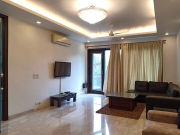 Living Room in 3 BHK Apartment at Defence Colony – for Rent