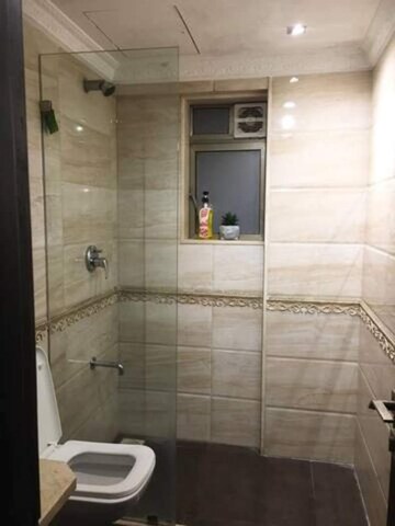 Bathroom in 3 BHK Apartment at Defence Colony – for Rent