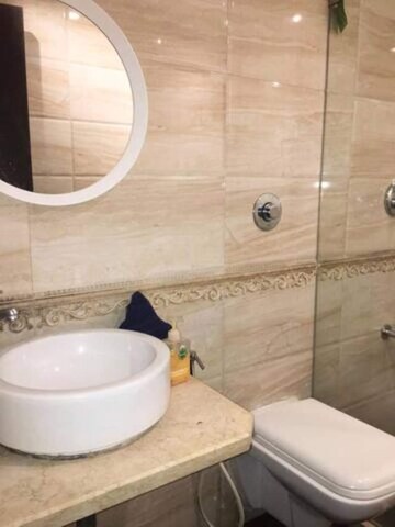 Bathroom in 3 BHK Apartment at Defence Colony – for Rent