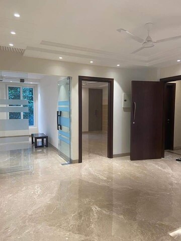 Living Room in 4 BHK Apartment at Defence Colony – for Rent