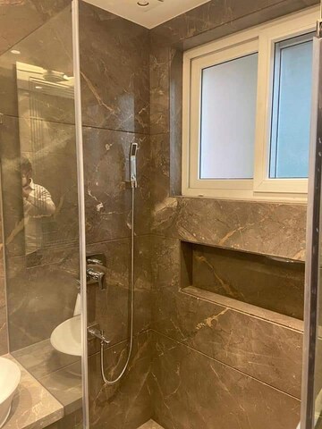 Bathroom in 4 BHK Apartment at Defence Colony – for Rent