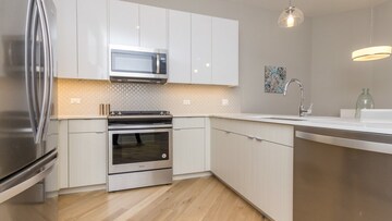 Kitchen in 1.5 BHK Apartment at Defence Colony – for Rent