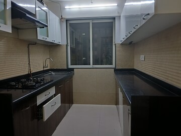 Kitchen in 2 BHK Apartment at Romell Diva, Malad West – for Rent