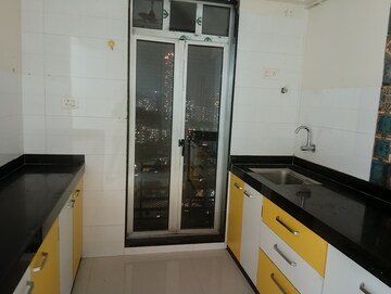 Kitchen in 2 BHK Apartment at Solitaire Heights, Malad West – for Rent