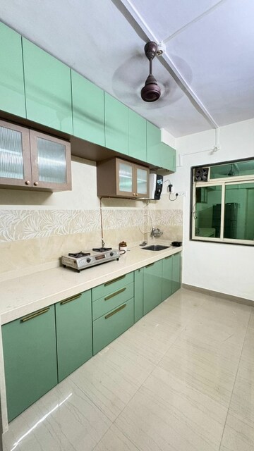 Kitchen in 2 BHK Apartment at Hiranandani Garden Blue Bell, Powai – for Rent