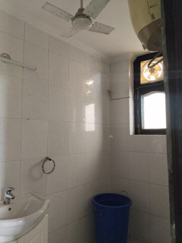 Bathroom in 3 BHK Builder Floor at Ambience Multi Unit Residential Apartments, Jasola – for Rent