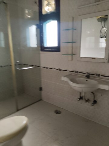 Bathroom in 3 BHK Builder Floor at Ambience Multi Unit Residential Apartments, Jasola – for Rent