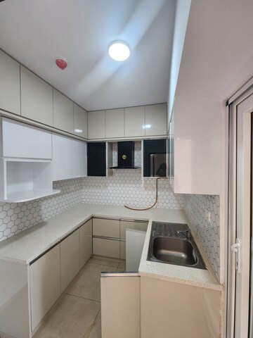 Kitchen in 1.5 BHK Apartment at Bhartiya Nikoo Homes, Thanisandra Main Road – for Rent