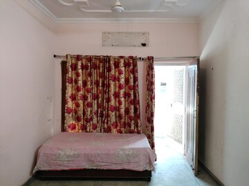 Bedroom in 2 BHK Apartment at Harsh Apartments, Sector 10 Dwarka – for Rent