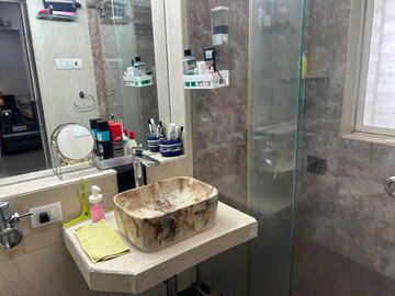 Bathroom in 3 BHK Apartment at Rustomjee OZone, Goregaon West – for Rent