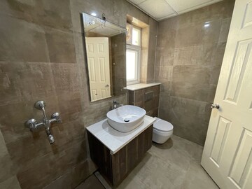 Bathroom in 3 BHK Apartment at Jaypee Pavilion Heights IV, Sector 128 – for Rent