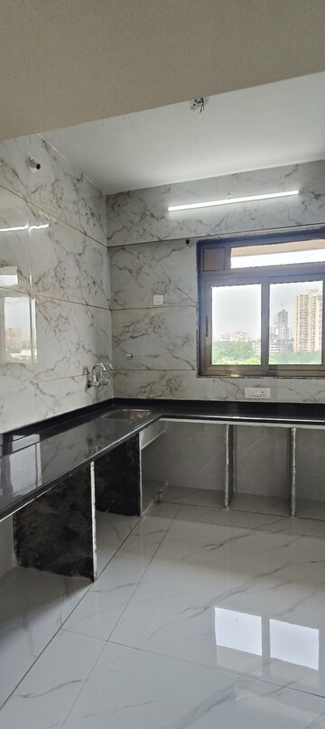 Kitchen in 2 BHK Apartment at Sadguru Apartment Kalyan, Kalyan West – for Sale